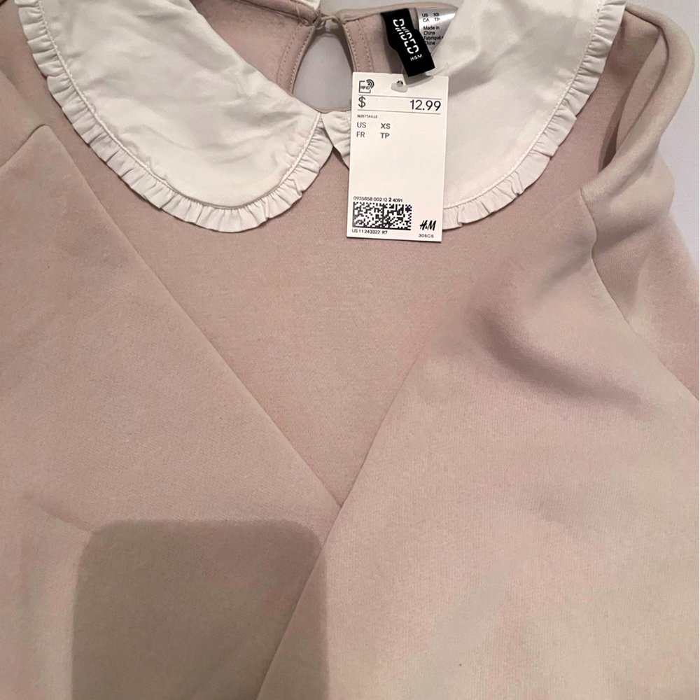 Women’s H and M long sleeve blouse. With color. Size XS. Runs big. Brand new.